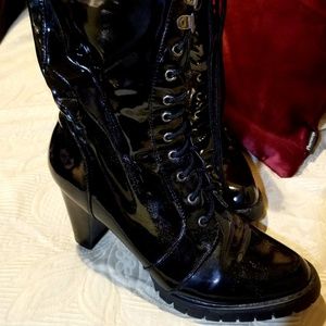 - Black patent calf length sexy boots. Like new.